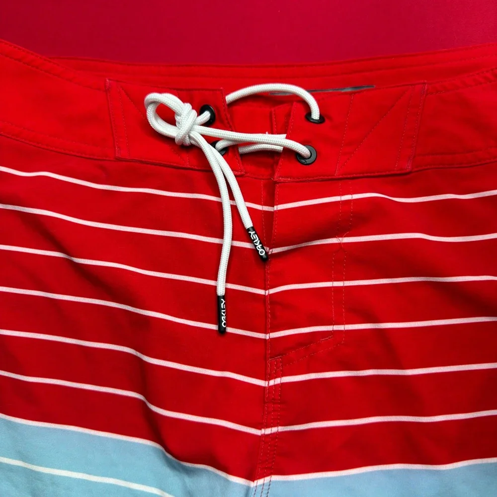 SURF Oakley Mens Board Shorts Red Striped Tropical Floral Swim Trunks Size 31